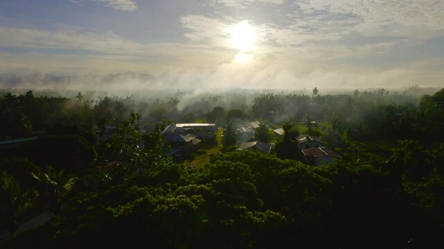 aerial view of remote village in papua new guinea during sunrise