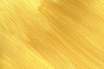 Gold acrylic paint texture on white paper background