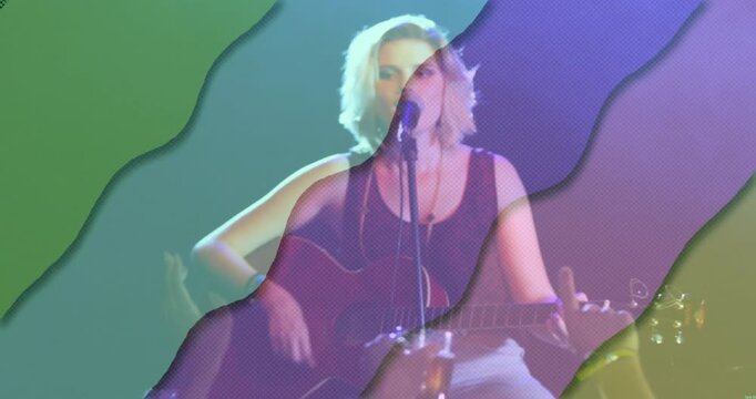 Shapes sweeping in musician strumming guitar singing music as overlays intensifying then fading