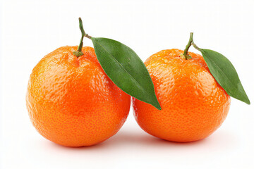 Two ripe mandarins with green leaves isolated on white