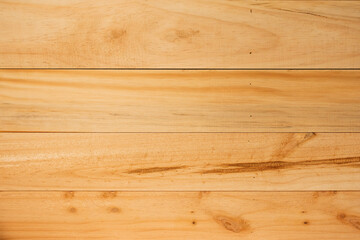 Wooden planks texture, close-up view, with natural wood grain and warm tones