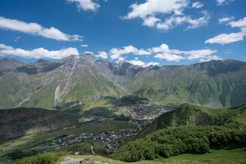 Fototapeta premium Kazbegi mountain range in northern Georgia near the border of Russia