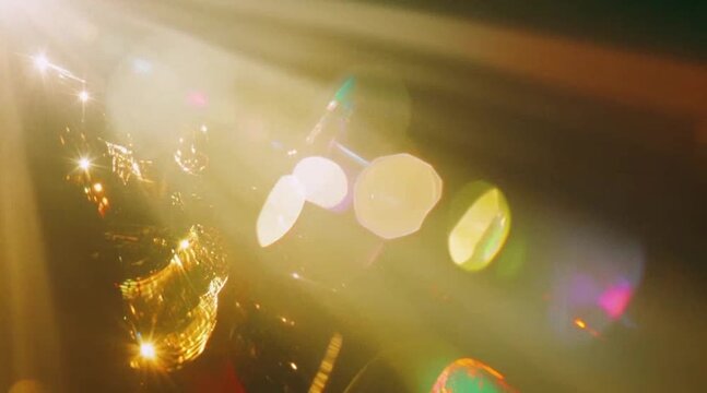 Golden Light: Flare and Lens Effects in a Dreamy, Bokeh Background