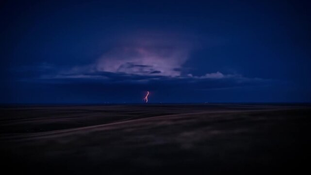 Lightning Strike Over Dark Rolling Hills at Night