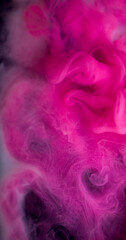 Cloud vapor. Blend ink. Defocused pink purple color water splash flow swirling fog texture circling on abstract dark black background.