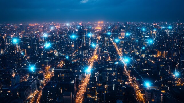 Night view of a sprawling smart city with glowing blue digital network points linking buildings, symbolizing futuristic communication, connectivity, and global data transfer infrastructure systems.