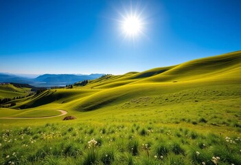 Obraz premium Rolling green hills, sun-dappled meadows, distant mountains, clear blue sky, landscape, background image