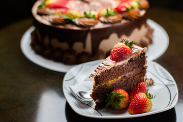 Chocolate Drip Cake with Strawberries on Elegant Display