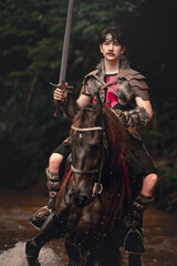 Heroic Rider on Horseback with Sword in Fantasy Landscape