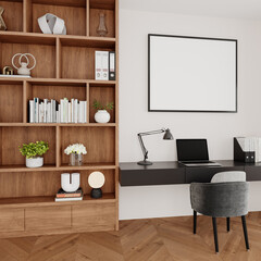Minimal office with horizontal framed artwork and bookshelf styling