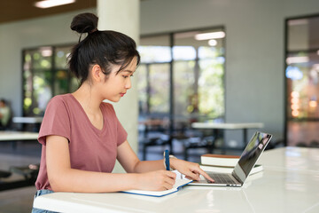 Education, writing notes and girl in college for knowledge, assignment project or learning. Book, woman and student studying for exam research, test preparation or scholarship in university.