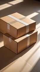 Two Brown Cardboard Boxes Stacked With Scotch Tape on Textured Surface in Sunlight