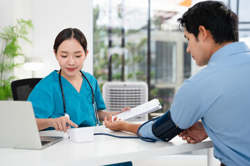 Blood pressure, man and doctor in office with discussion, help and advice for hypertension. Clinic,...