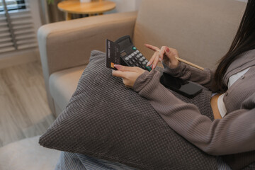 she is using a credit card for some transactions, pay with a credit card or debit card, the right...