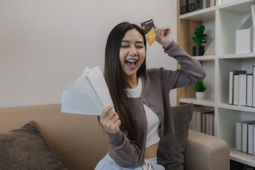 she enjoys shopping online by paying wit her credit card, the balance on her debit card is enough...
