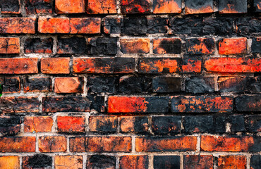 Verbrannte Backsteinmauer