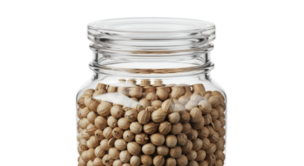 Glass jar of coriander seeds spice container kitchen ingredient food photography