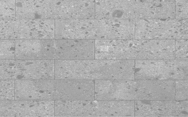 Modern grey stone brick wall texture. A clean terrazzo or concrete block background with a stacked bond pattern, ideal for architectural visualization and interior design surfaces.