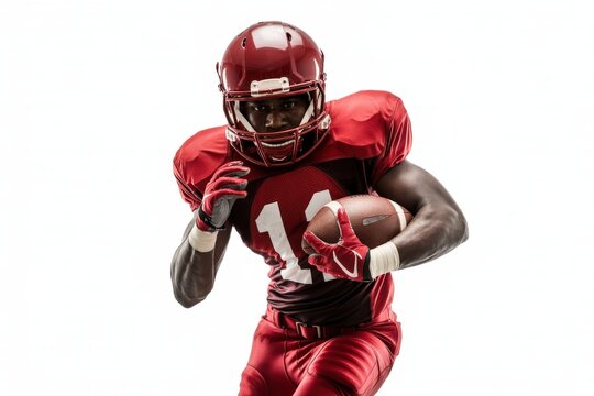 Determined american football player in red uniform running with the ball