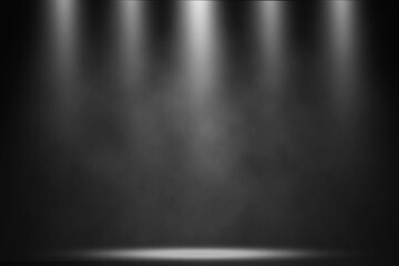 Five white spotlights shine brightly on an empty stage, casting dramatic beams into the smoky background.