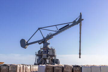 Crane Handling Cargo Packages at Port Industrial Work in Action