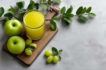 Fresh green apples and yellow juice in a glass on a wooden cutting board, surrounded by vibrant leaves, showcasing healthy eating and natural ingredients for a refreshing lifestyle