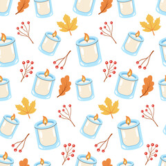 autumn seamless pattern with a warm candle, maple leaves and berries, perfect for fall themed designs and seasonal projects