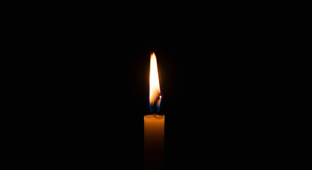 Solitary Candle Flame Illuminating Darkness Symbol of Hope and Remembrance.