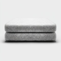Folded White And Gray Towels On Light Gray Background