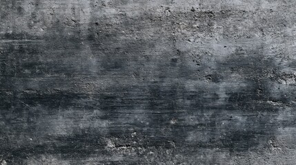 Obraz premium A close-up view of a rough concrete surface displays various shades of gray with distinct textures and weathered patterns, suggesting an industrial or urban environment.