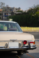 The tail lights, turn signals, and chrome accents on the rear of classic cars exude vintage charm and sophisticated design.