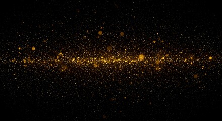 Golden particles on a black background