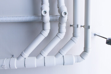 Structure system plastic pipes under building or apartment. Plumbing rough-in or electrical conduit in commercial building with pvc pipe in construction site of apartment.