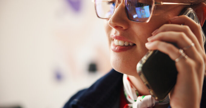 Phone call, glasses and online with business woman in office for graphic designer, client briefing and contact. Project progress, communication and reflection with person in creative agency for space