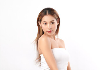 A beautiful young Asian woman with clean, fresh skin against a white background. Skincare, facial...