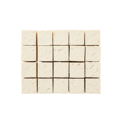 A top down view of numerous white tofu cubes meticulously arranged in a grid. Perfect for showcasing healthy, plant based ingredients and culinary concepts.