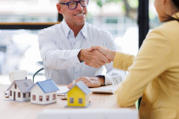 Business man offer and give hand for handshake in office. Successful job interview. Apply for loan...
