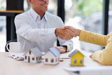 Business man offer and give hand for handshake in office. Successful job interview. Apply for loan...