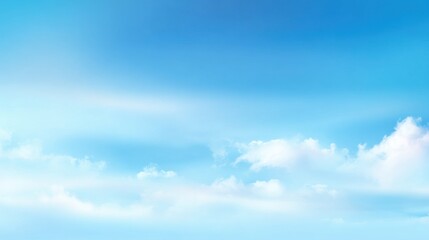Fototapeta premium A vibrant blue sky adorned with fluffy white clouds, creating a serene atmosphere. This clear weather captures the essence of a sunny day, inviting outdoor activities.