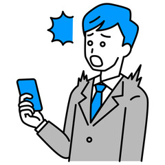 スマートフォンの画面を見て驚くスーツの男性