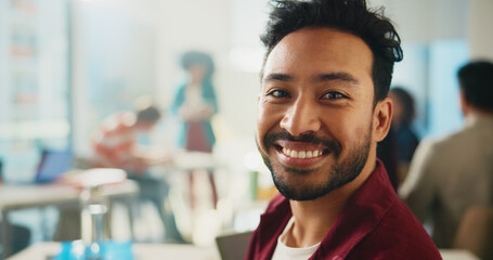 Portrait, student and man in class, university and smile with learning, creativity and knowledge. Face, happy person and scholarship with college, growth and studying with education and academy