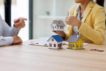 House model over the Sale representative offer the price list and condition for purchase or rental...