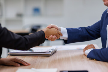 Happy Two business handshake to congratulate success. Successful Asian business people working together team.
