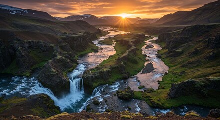 Fototapeta premium Sunset over waterfall valley landscape