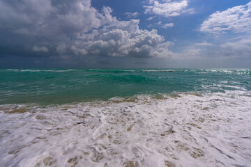 Exotic sea beach waves. Stormy sea waves. Summer sea beach wave. Rolling foamy sea beach waves. Refreshing ocean breeze. Dreamy beach scenery. Ocean waves background.