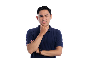 Thoughtful Asian man with serious expression and hand on chin thinking deeply isolated on...