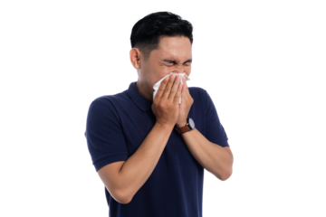 Sick man sneezing into tissue with eyes closed showing flu or allergy symptoms isolated on transparent background