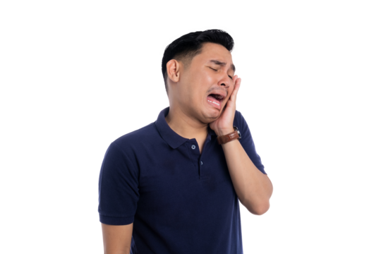 Young man suffering from toothache while holding his cheek in pain isolated on transparent background
