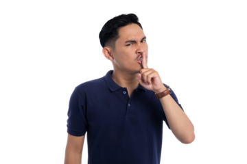 Serious man making shush gesture with finger on lips asking for silence isolated on transparent background