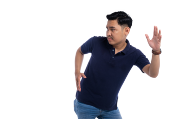 Asian man making defensive gesture with cautious expression wearing navy blue polo shirt isolated on transparent background